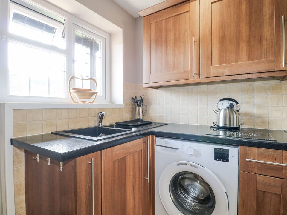 Fridge, microwave, toaster, cookware/dishes/utensils