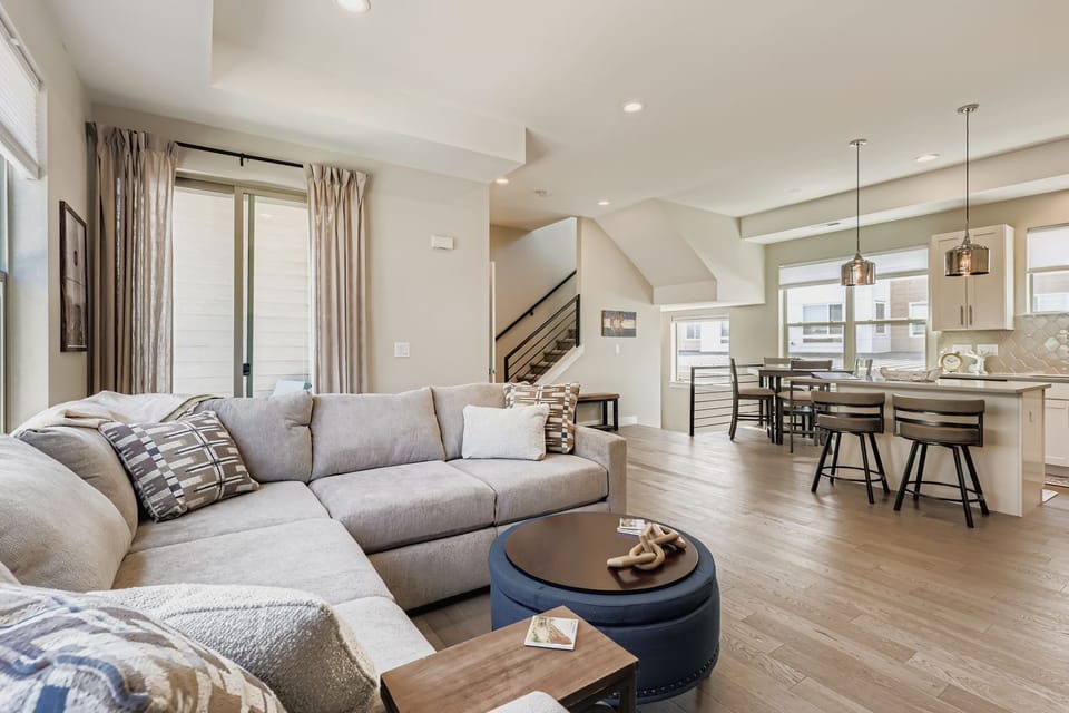 Unwind in this bright, modern living space with plush seating and seamless flow to your fully equipped kitchen.