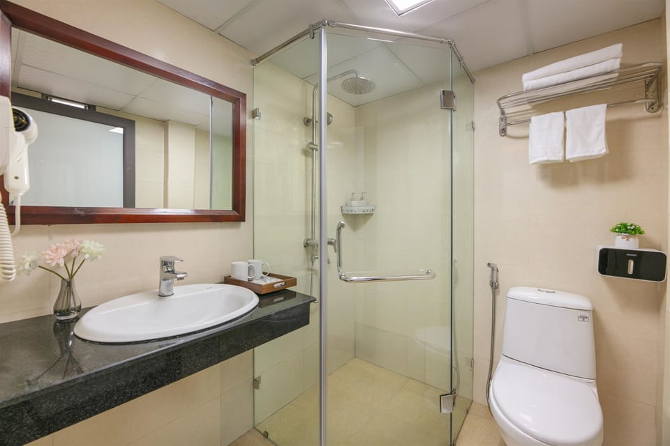 Shower, hydromassage showerhead, designer toiletries, hair dryer