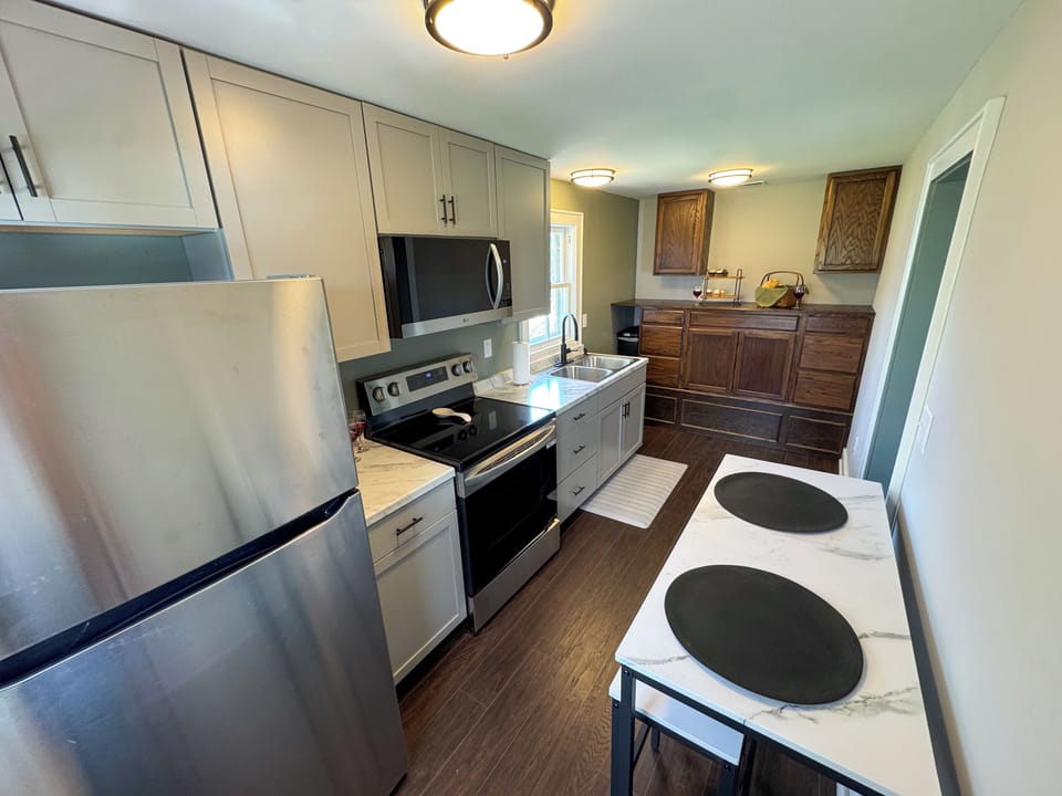 Enjoy a fully equipped kitchen, complete with cookware for your stay.