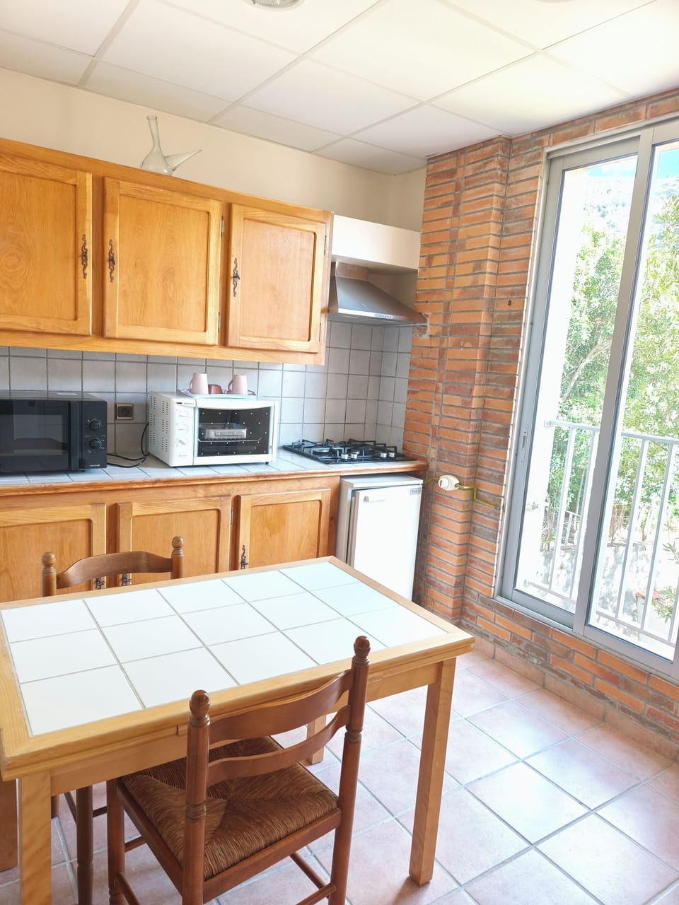 Classic Apartment, Balcony, Mountain View | Private kitchen | Highchair