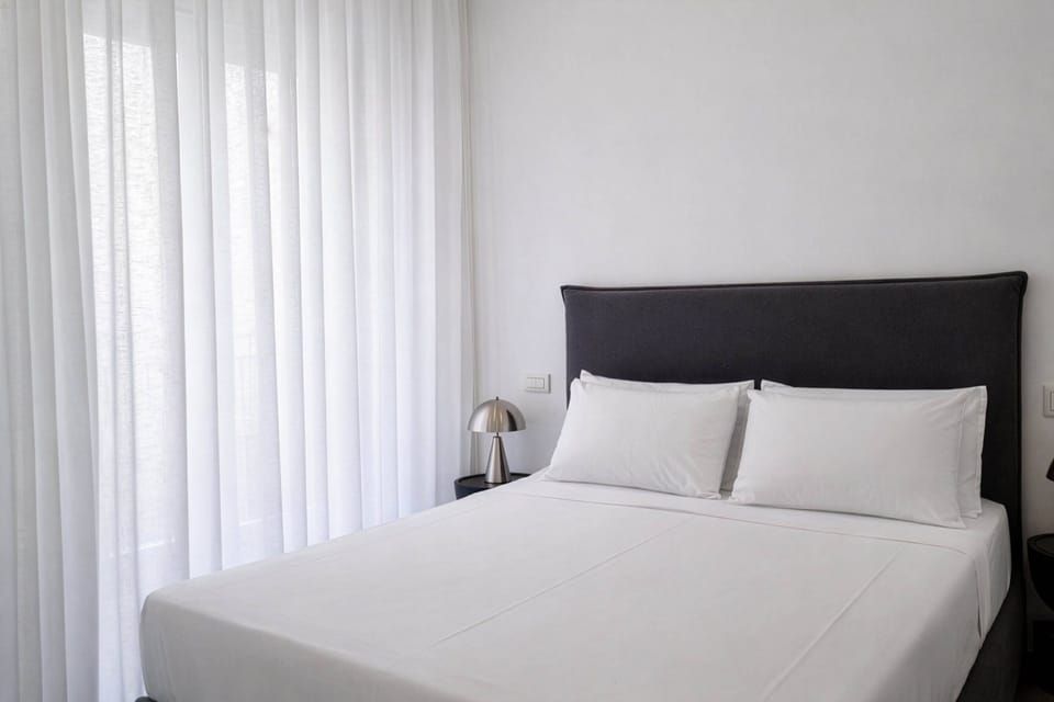 Apartment, 2 Bedrooms, Balcony, City View | Blackout drapes, iron/ironing board, free WiFi