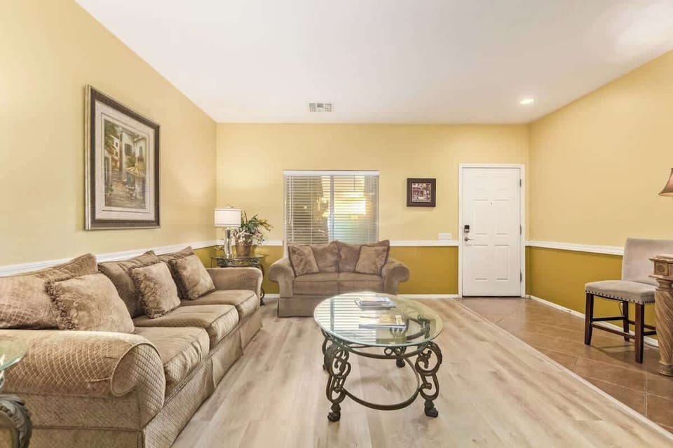 Cozy hangout zone with comfy seating and a smart TV, perfect for movie nights or lazy mornings.