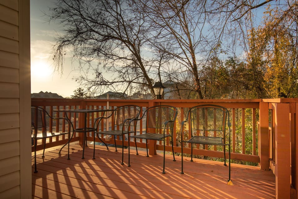 Unwind on the private patio with a peaceful view of the outdoors.