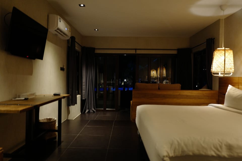 Air Sea View Bungalow Double Room | In-room safe, desk, laptop workspace, blackout drapes