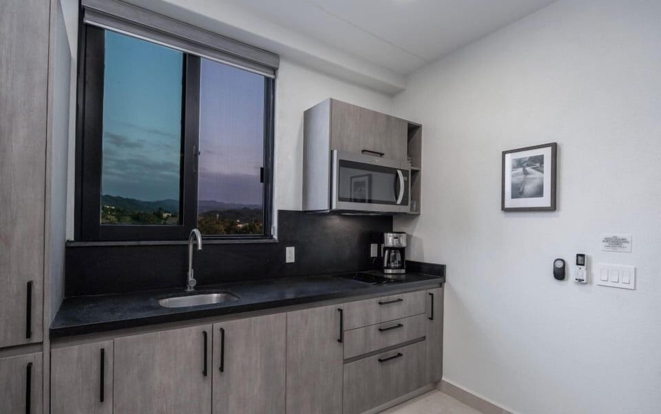Deluxe Condo, Balcony, Partial Ocean View | Private kitchen