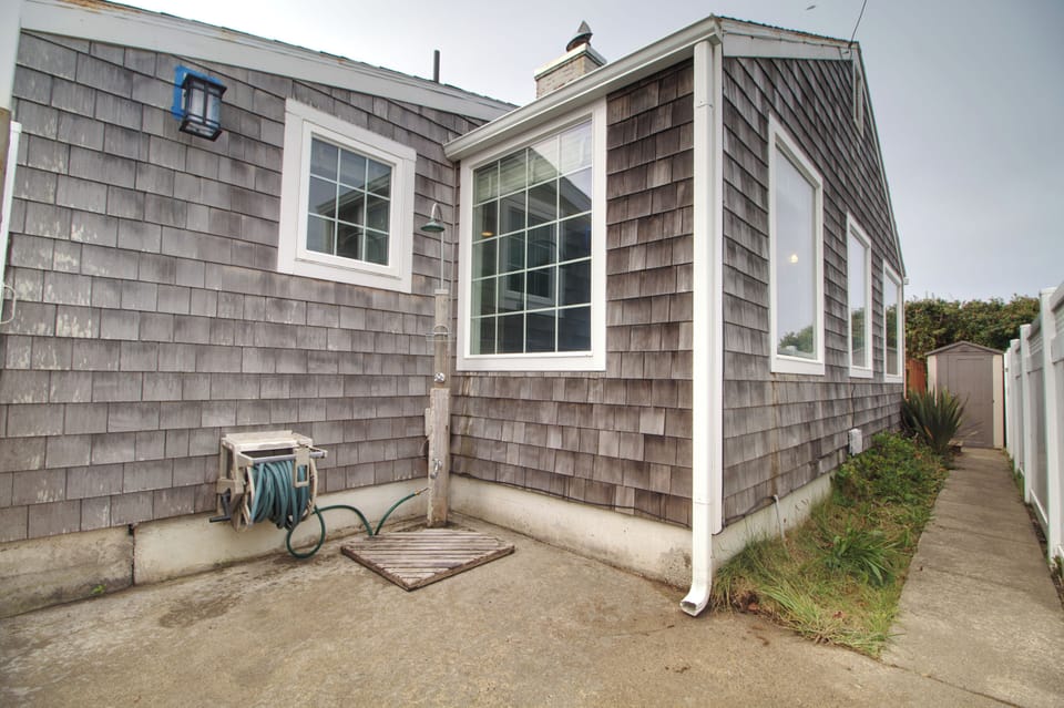 Outdoor shower to rinse off sand after a day at the beach