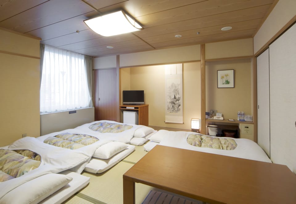 Japanese Style Room for 4 Guests, Non Smoking | Desk, blackout drapes, free WiFi, bed sheets