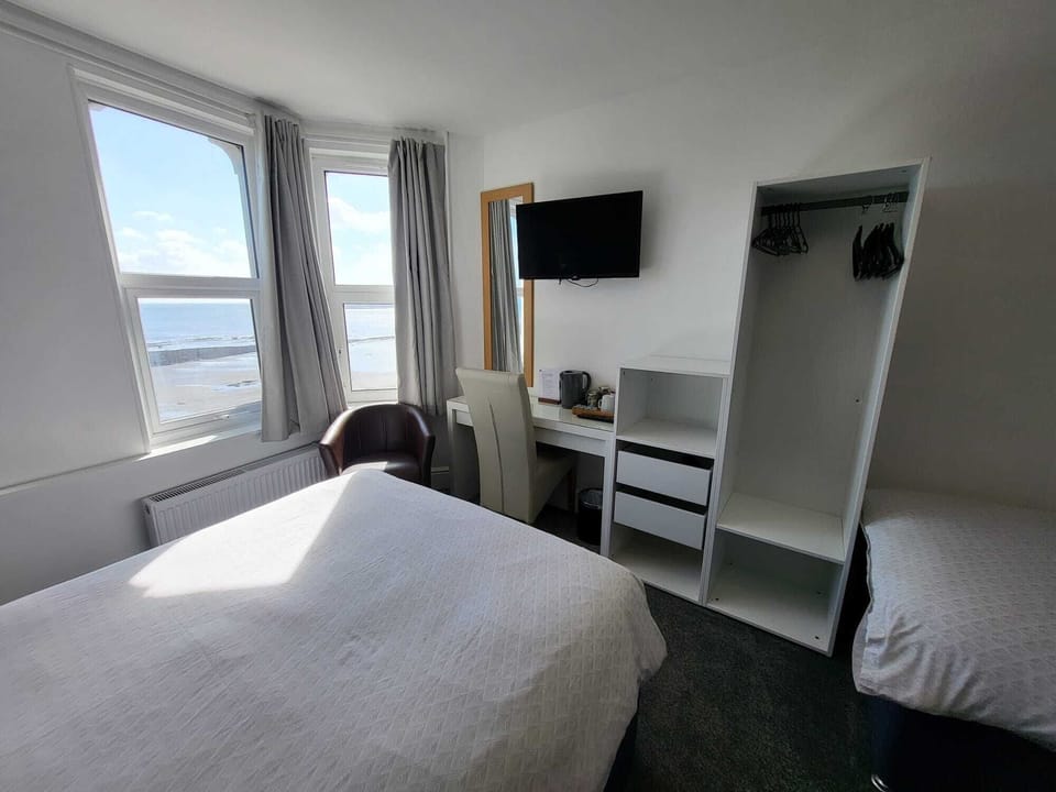 Family Room, Sea View | Iron/ironing board, free WiFi, bed sheets
