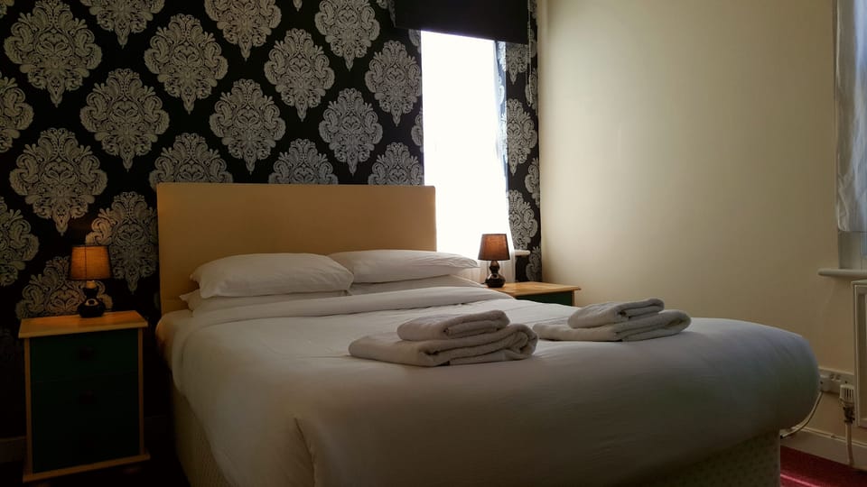 Standard Double Room | Desk, blackout drapes, WiFi (free), bed sheets