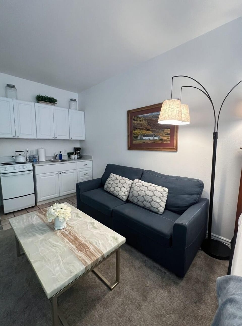 Settle in on this modern sofa and enjoy a relaxing space perfect for movie nights or quiet mornings.