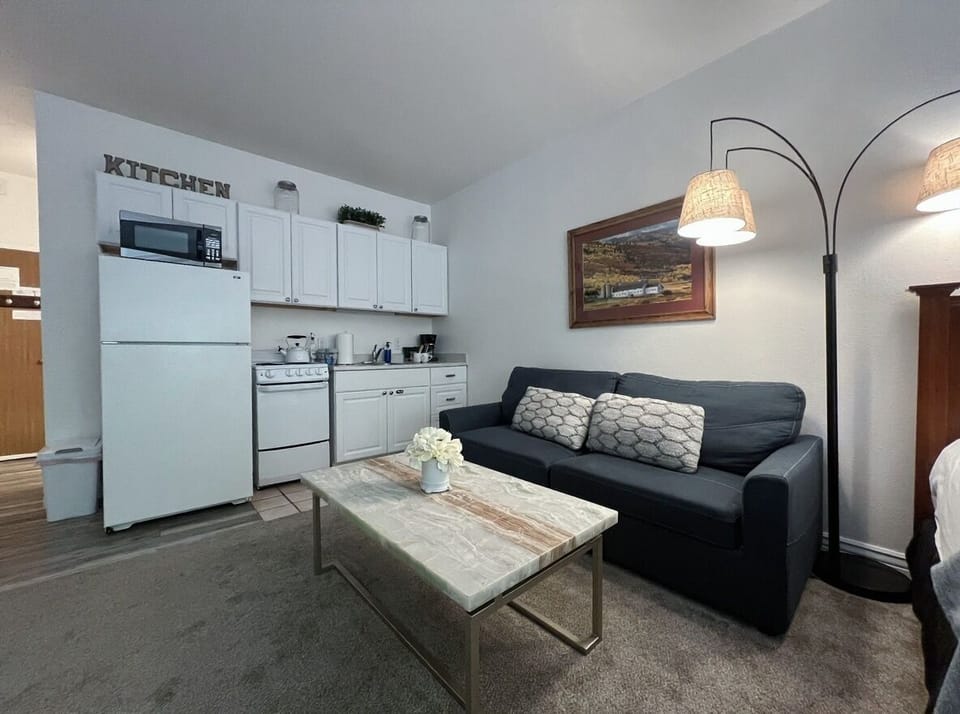 Experience seamless comfort in this open-concept living and kitchen area designed for easy, relaxing stays.