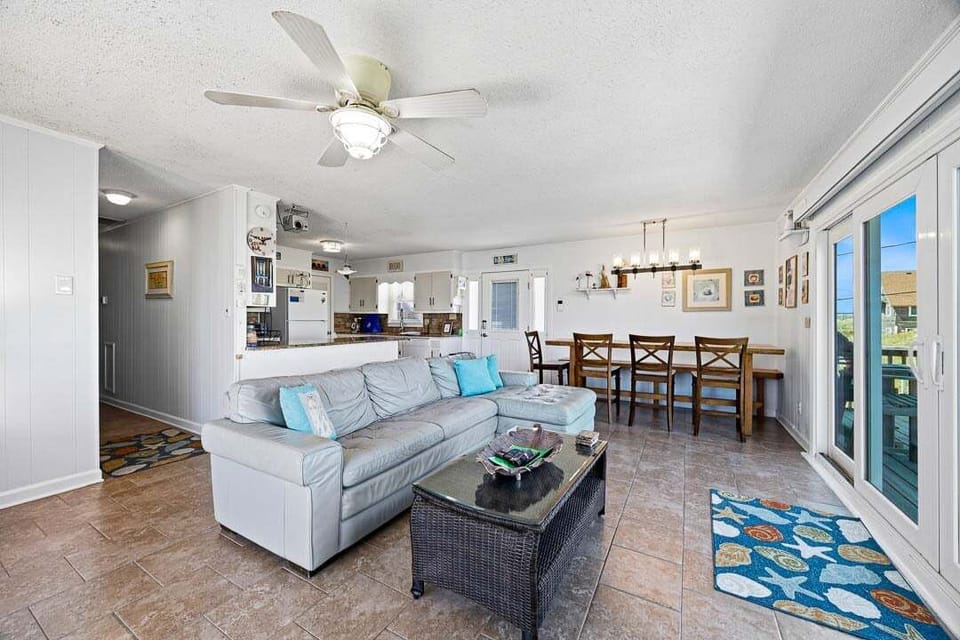 Top-Level Living Room with Deck Access