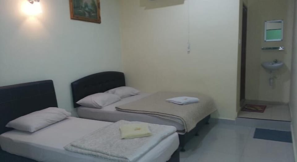 Family Triple Room | Desk, iron/ironing board (on request), rollaway beds (surcharge)