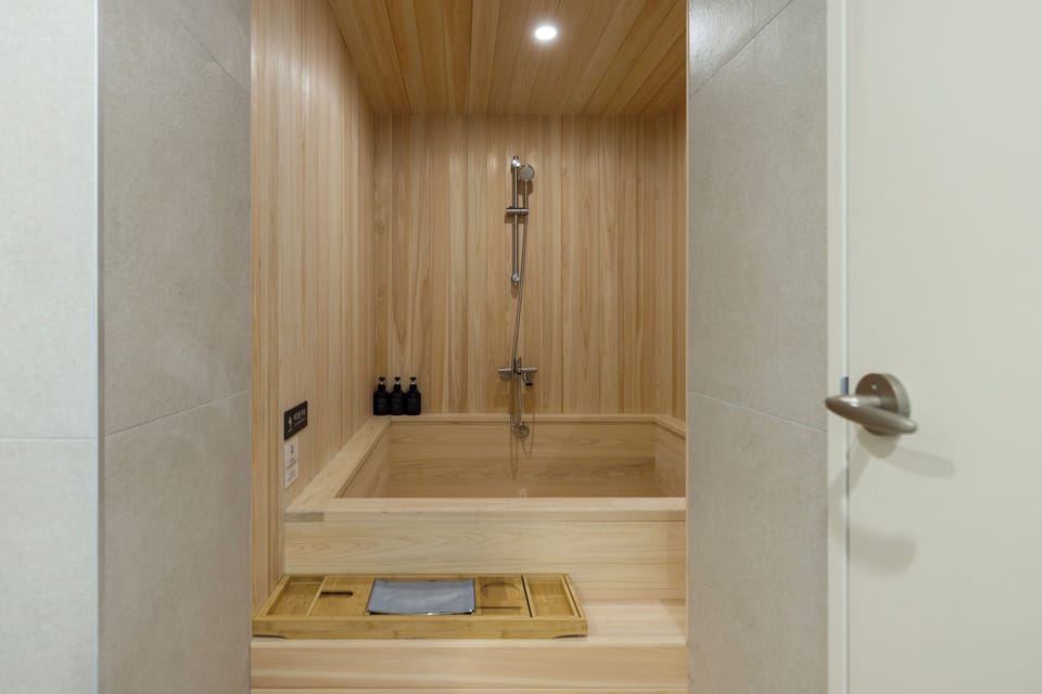 Relaxtion Hinoki Room | Bathroom | Deep soaking tub, hair dryer, bathrobes, slippers