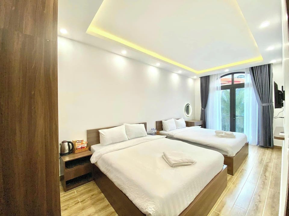 Family Quadruple Room, City View | Blackout drapes, iron/ironing board, free WiFi