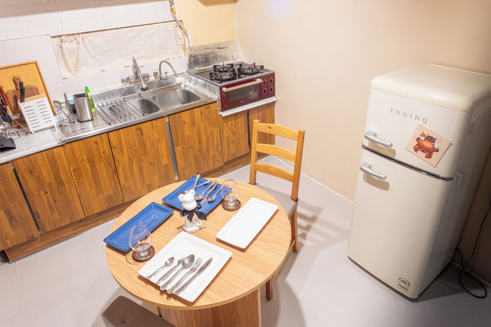 Family Double or Twin Room, Balcony, City View | Private kitchen | Shared fridge, microwave