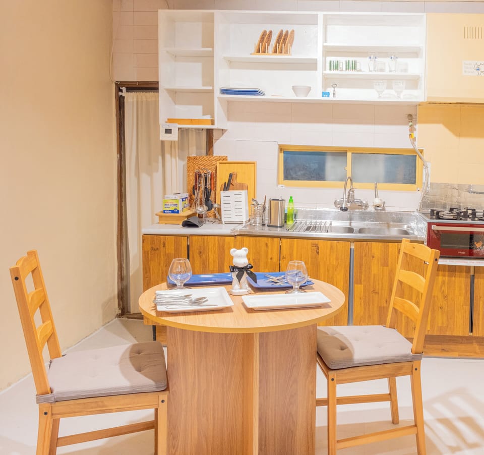 Family Double or Twin Room, Balcony, City View | Private kitchen | Shared fridge, microwave