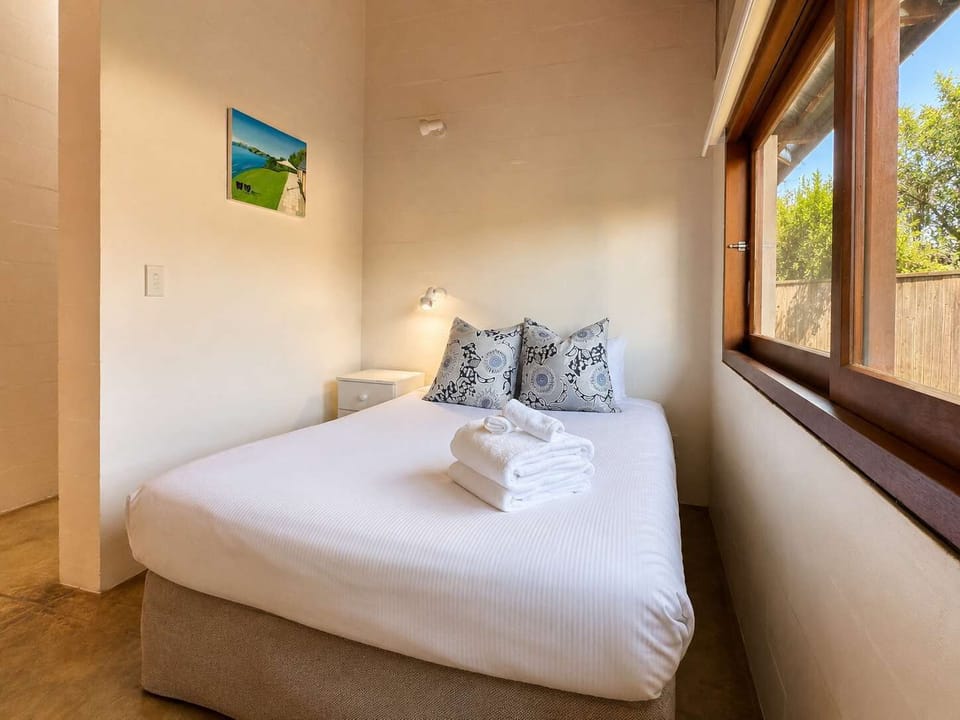 Bedroom 4 has a large wooden oversized sliding door