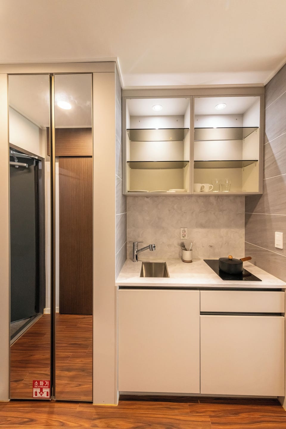 Mini-fridge, microwave, stovetop, cookware/dishes/utensils