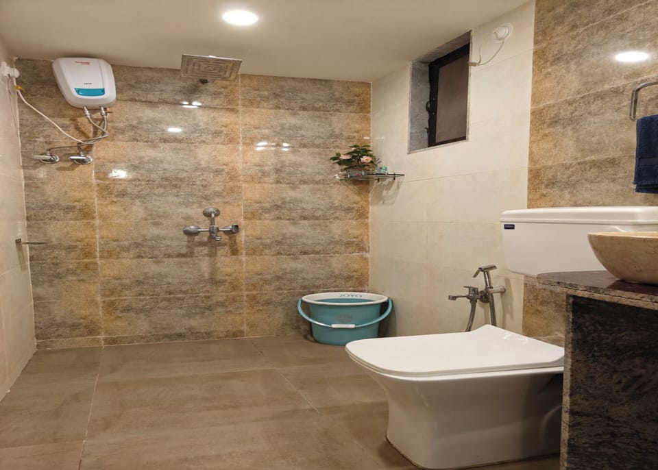 Family Double Room, Garden View | Bathroom | Hair dryer, towels, soap, shampoo