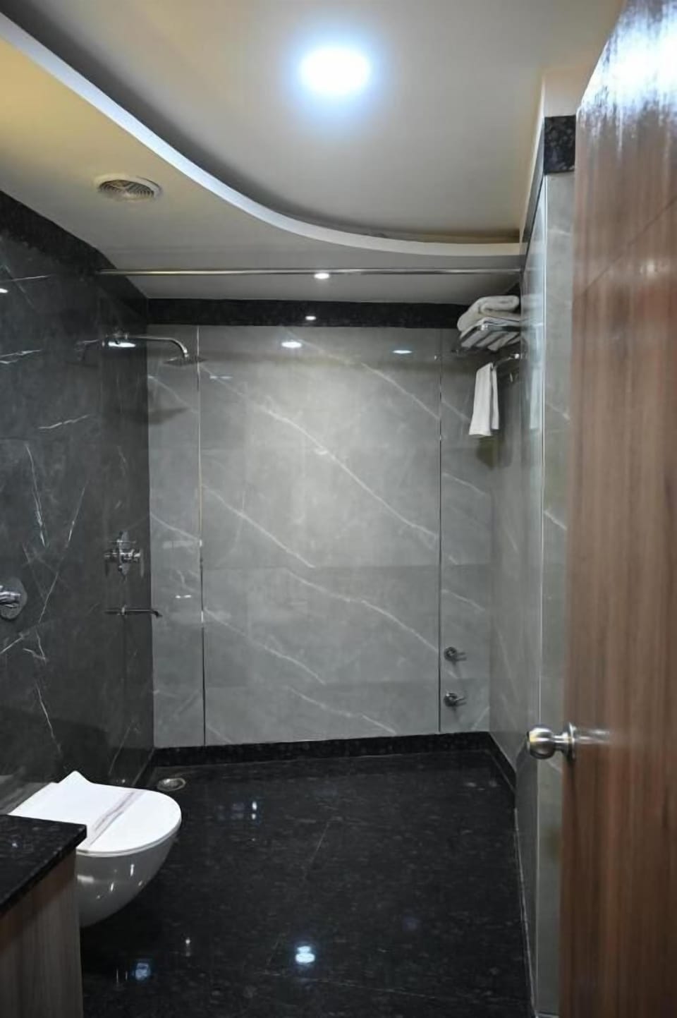 Suite, Balcony, City View | Bathroom | Slippers, towels