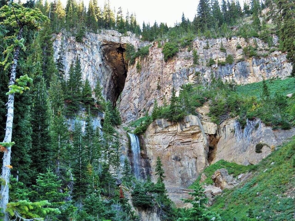 Visit Darby Wind Cave it is only 20 minutes outside of Driggs Idaho. This unique trail boasts pristine forests, meadows and a waterfall descending from a cave you can climb into.