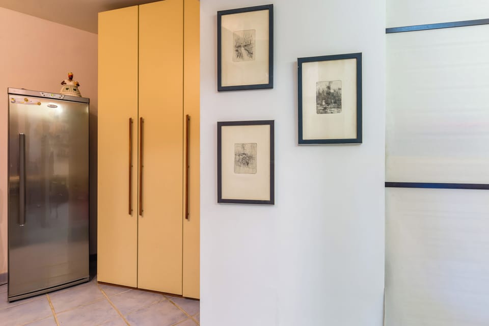 Apartment (1 Bedroom) | Living area | 32-inch Smart TV with cable channels