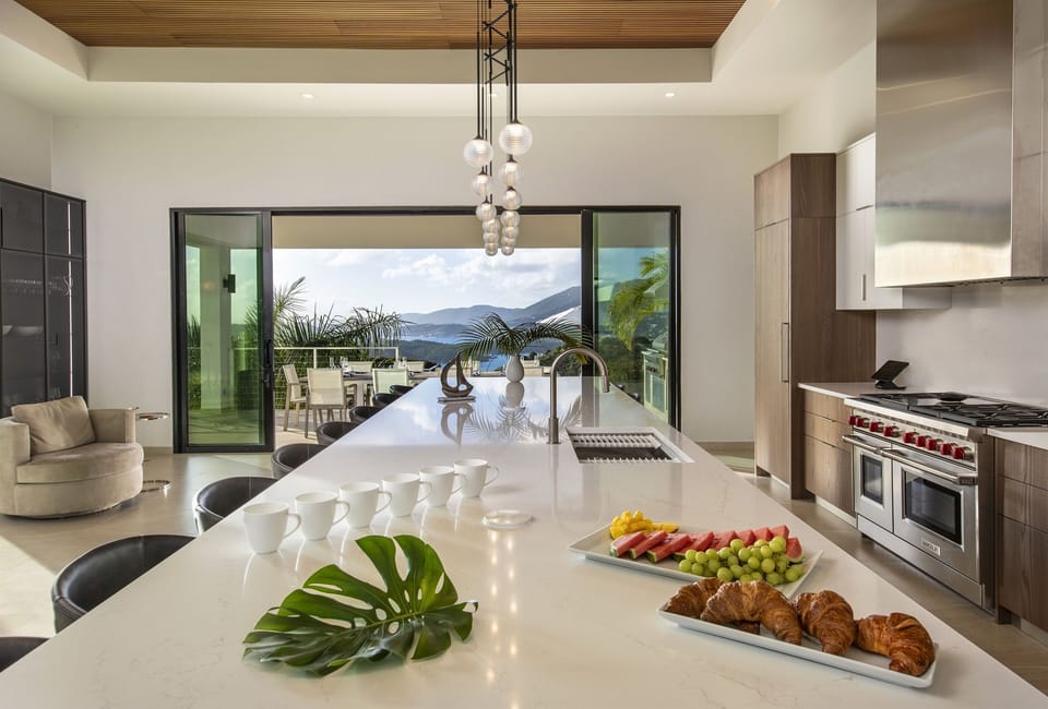 The kitchen is perfect for gatherings with Wolf and Sub-zero appliances 