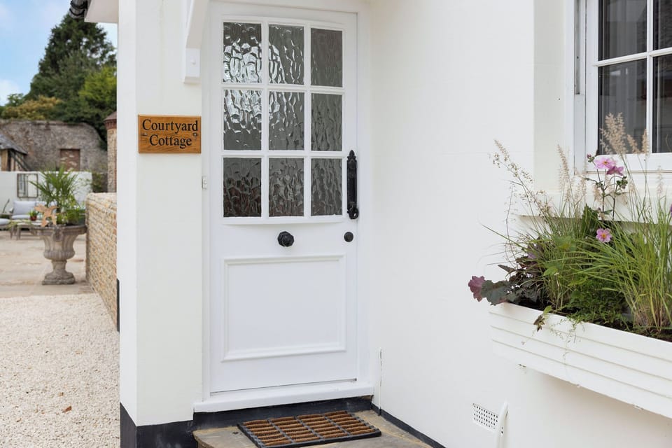 Front door, Courtyard Cottage sign 