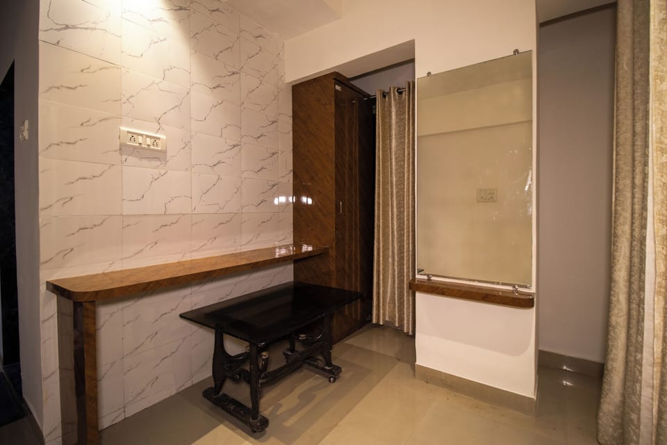 Quadruple Room, City View | Desk, laptop workspace