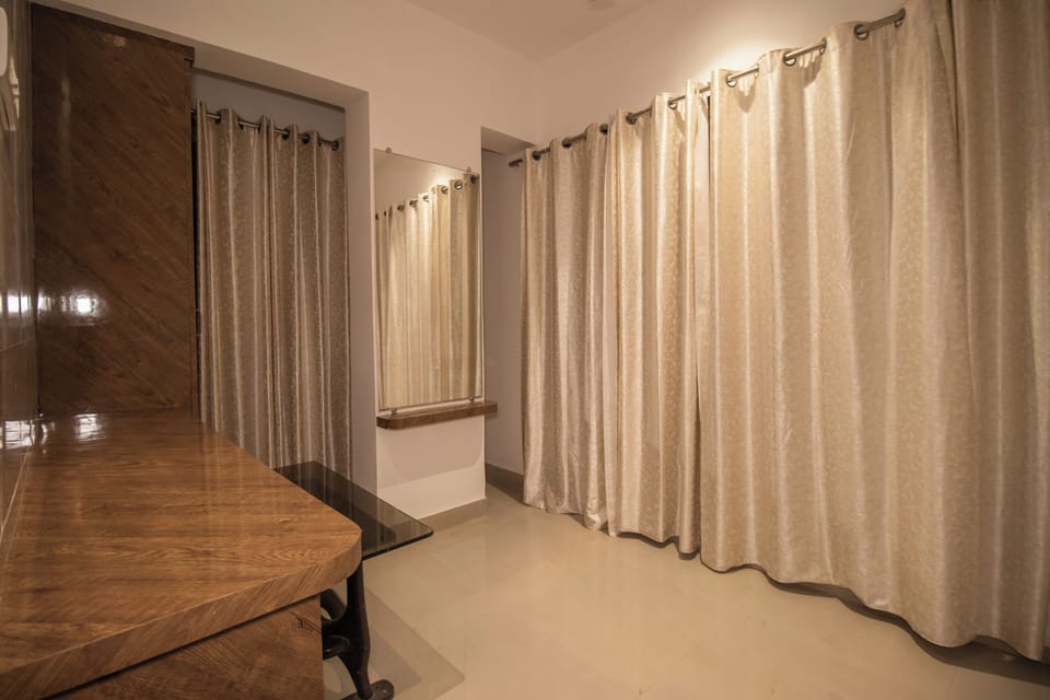 Quadruple Room, City View | Desk, laptop workspace