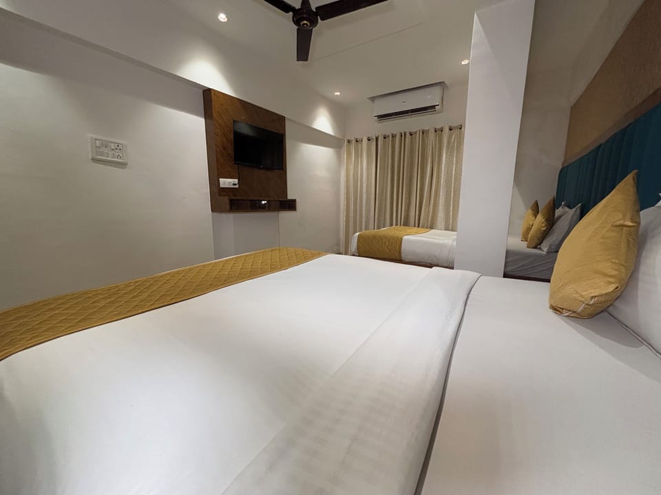 Quadruple Room, City View | Desk, laptop workspace