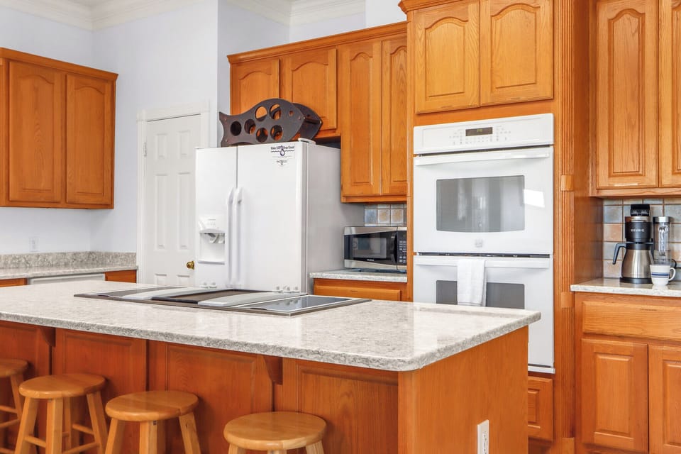 Stove top island with double ovens