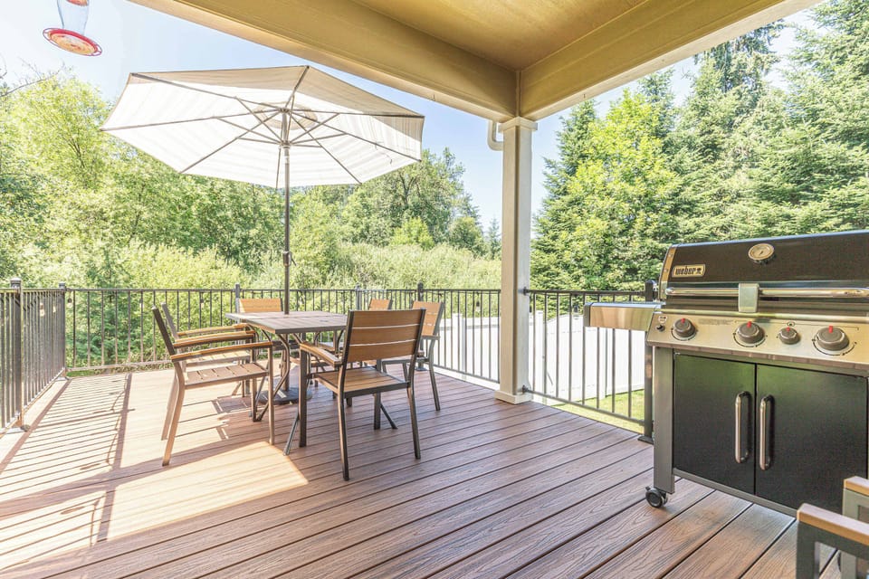 Host al fresco dinners or casual happy hours on this elevated deck, where sweeping views create the perfect backdrop for memorable gatherings.