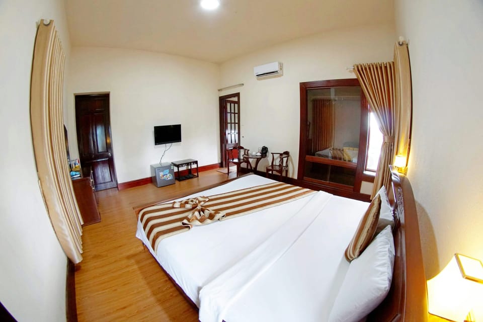 Deluxe Double Room, City View | Premium bedding, minibar, in-room safe, desk