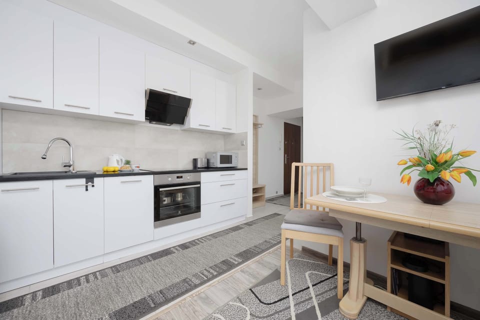 The fully equipped kitchenette includes everything you need for a home-cooked meal.
