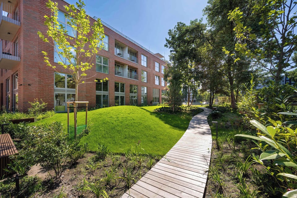 Greenery around the building. 