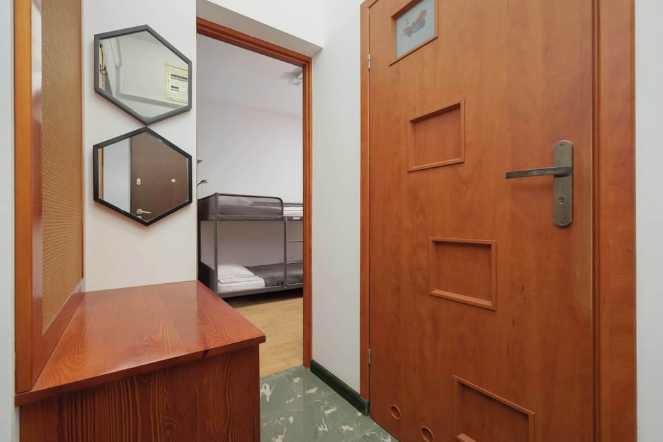 The bedroom's comfortable furnishings ensure a pleasant stay.