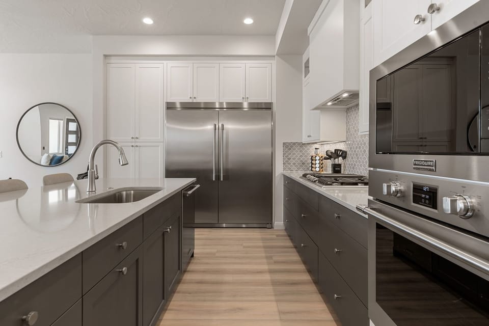 Townhome, 5 Bedrooms | Private kitchen | Fridge, oven, coffee/tea maker, toaster
