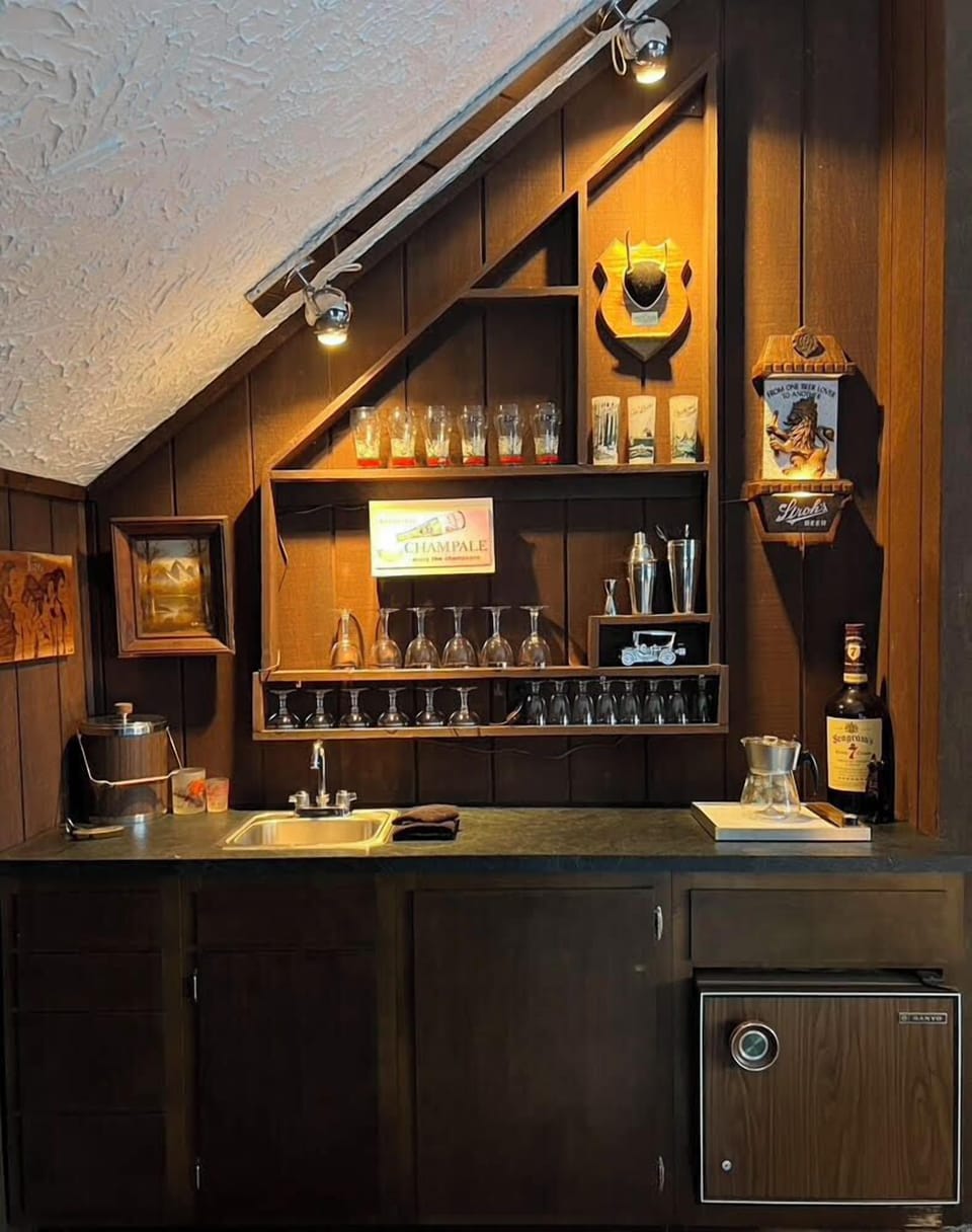  Custom wet bar with wine storage and coffee station
