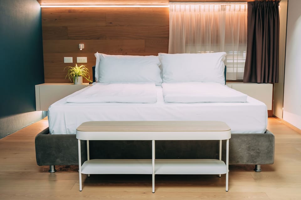 Premium bedding, down comforters, pillowtop beds, in-room safe