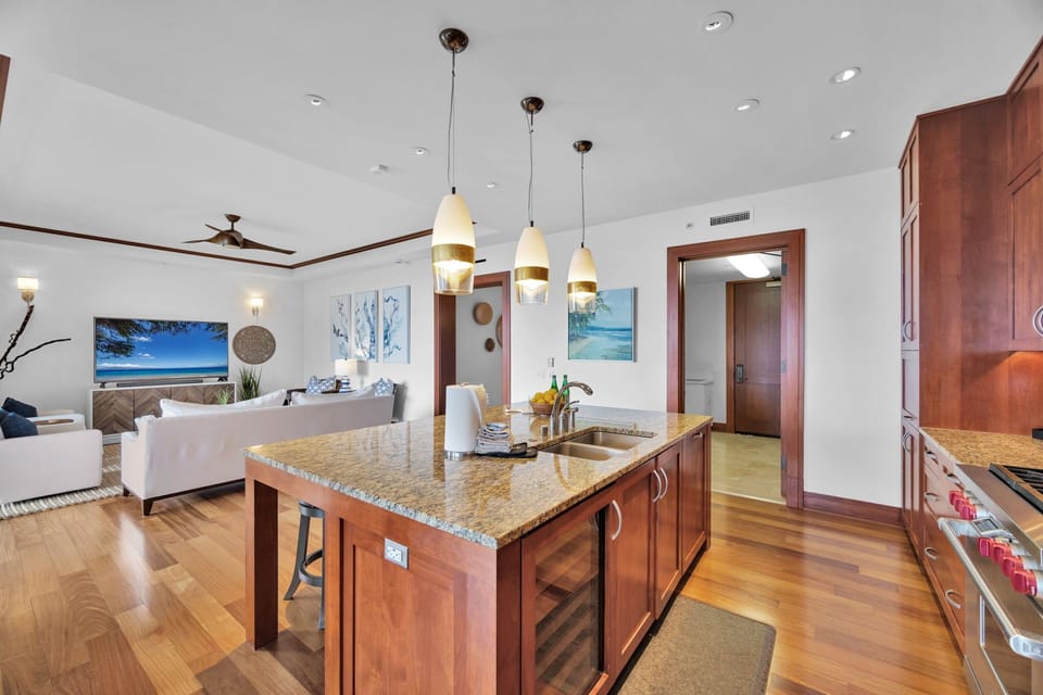 Enjoy a fully equipped kitchen opening into a bright living space 