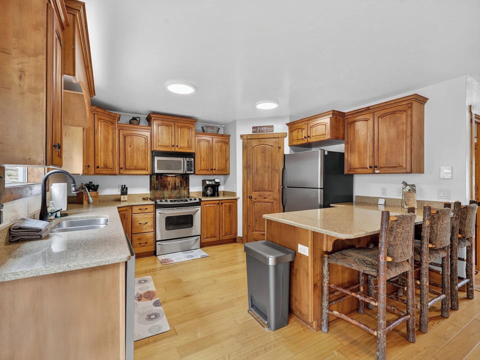 View of the fully stocked kitchen with everything you need for cooking and dining on the mountain