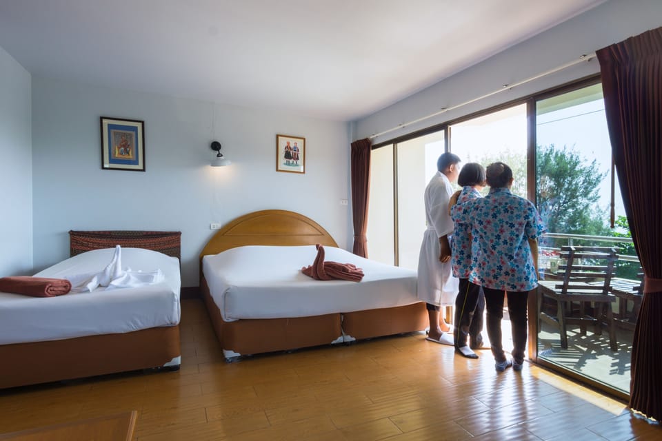 Family Room, Sea View | Desk, blackout drapes, free WiFi