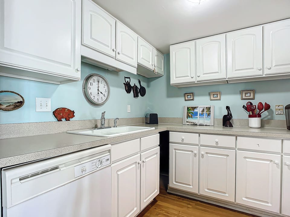 Condo, 1 King Bed with Sofa bed, Patio, Ocean View (Cottage By The Sea 146) | Private kitchen | Dining tables