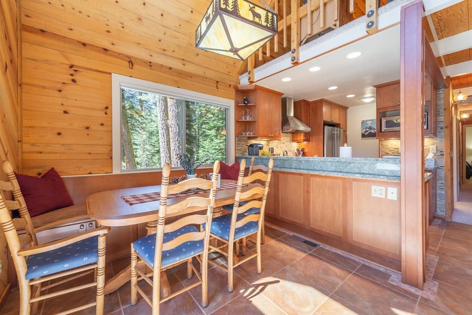 Dining for six: Enjoy comfort and conversation in the dining area that seamlessly opens up to the main living room and kitchen.