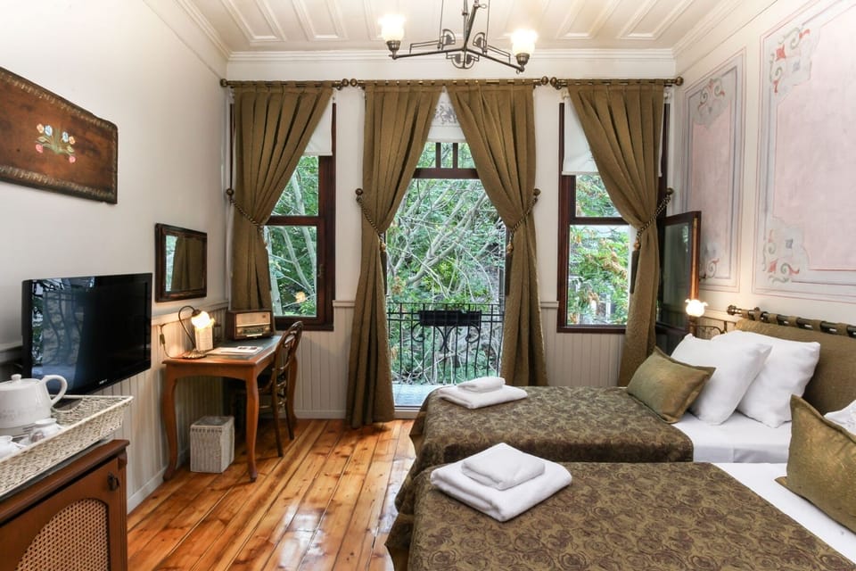 Standard Double or Twin Room | Minibar, iron/ironing board, free WiFi, bed sheets