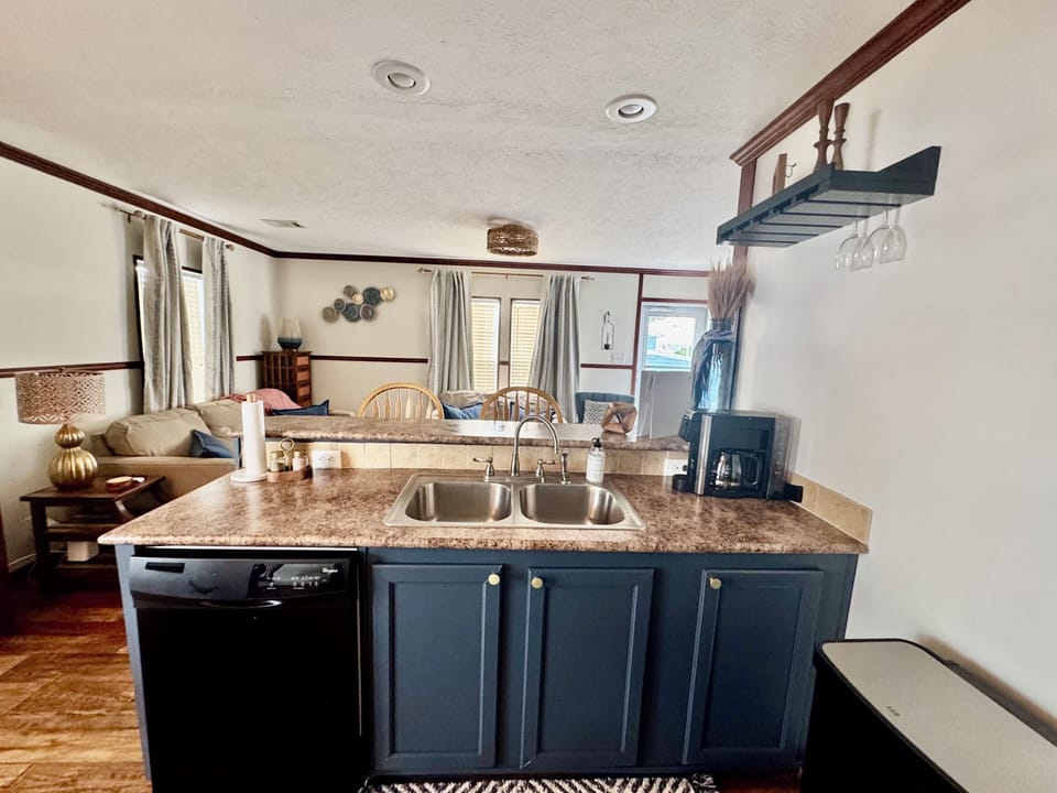 Kitchen looking into living room