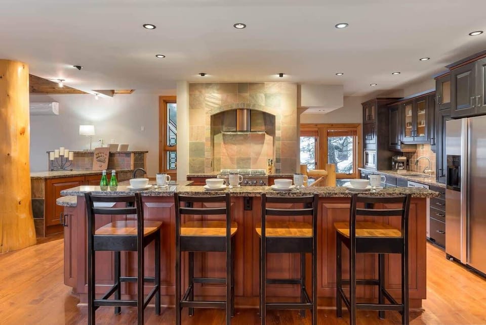 Long island seating invites group meals, morning coffee, or casual chats while meals come together